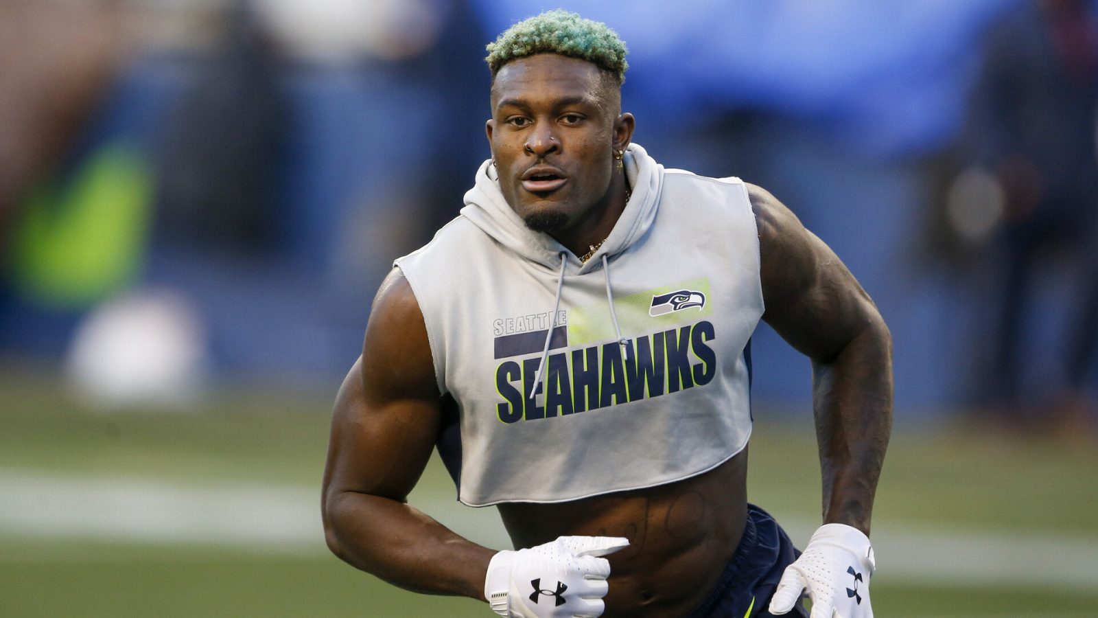 Seattle Seahawks wide receiver DK Metcalf warms up before a 2021 home game.