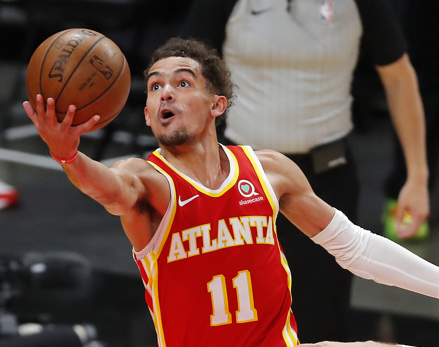Trae Young goes for a layup in a 2021 home game.