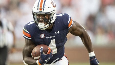 Tank Bigsby #4 from Auburn looks for running room.