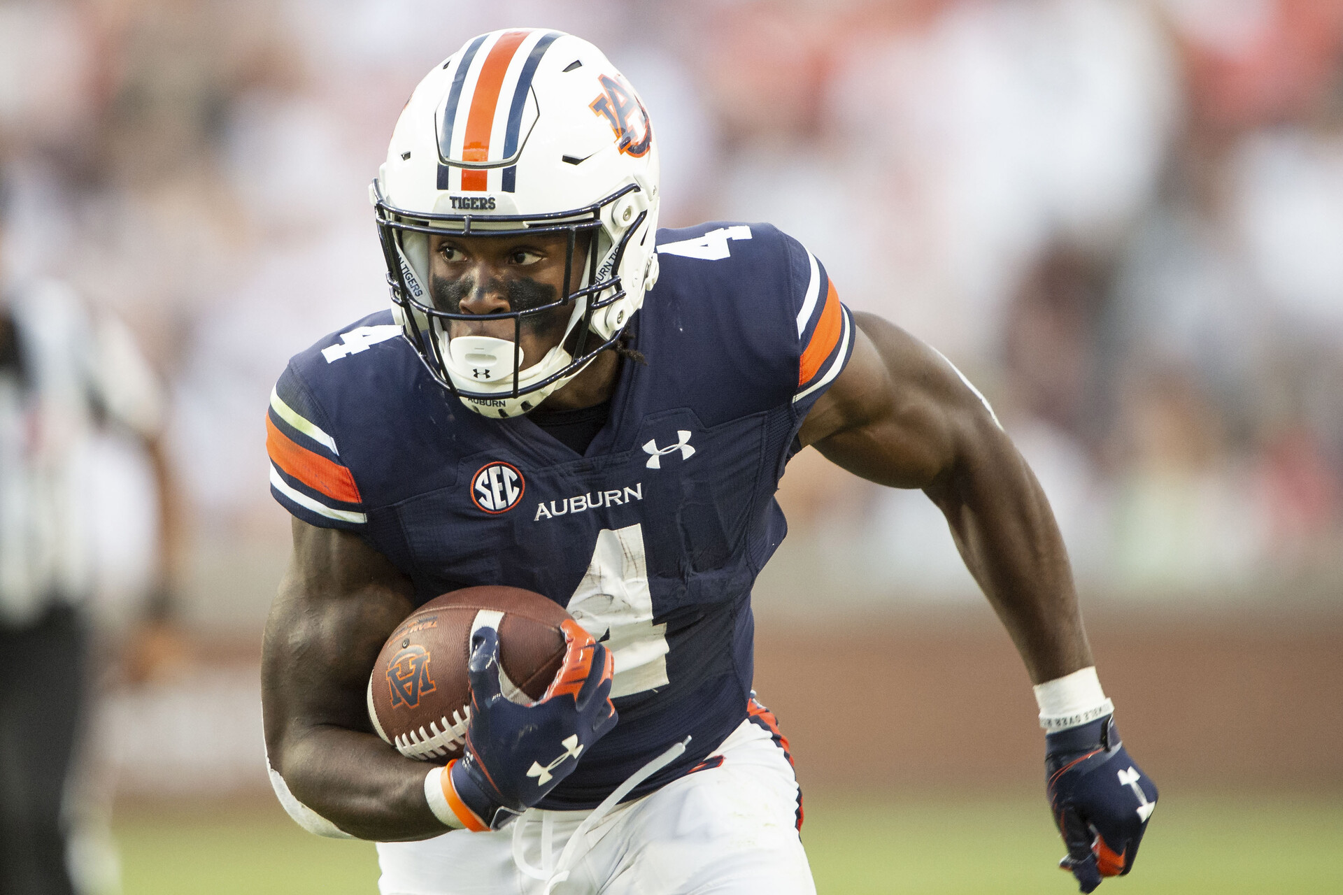 Tank Bigsby #4 from Auburn looks for running room.