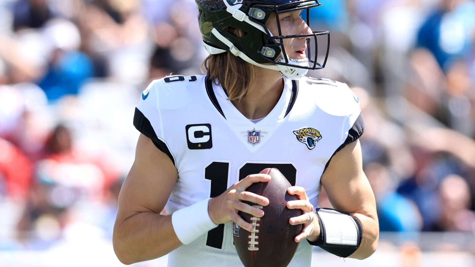 Jacksonville Jaguars quarterback Trevor Lawerence drops back to pass in a game