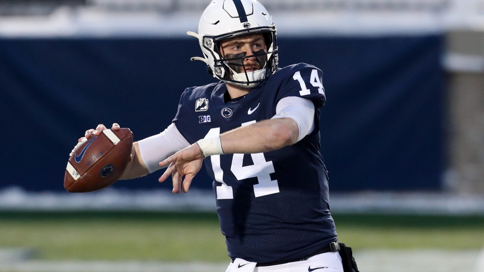 Penn State quarterback Sean Clifford #14 warms up before a 2021 home game.