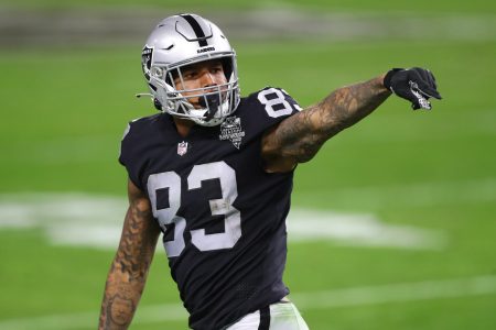 Las Vegas Raiders tight end #83 Darren Waller lines up for the next play in a 2021 home game.