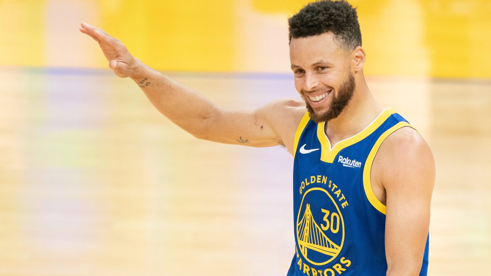 Golden State Warriors point guard #30 Stephen Curry celebrates in a 2021 road game.