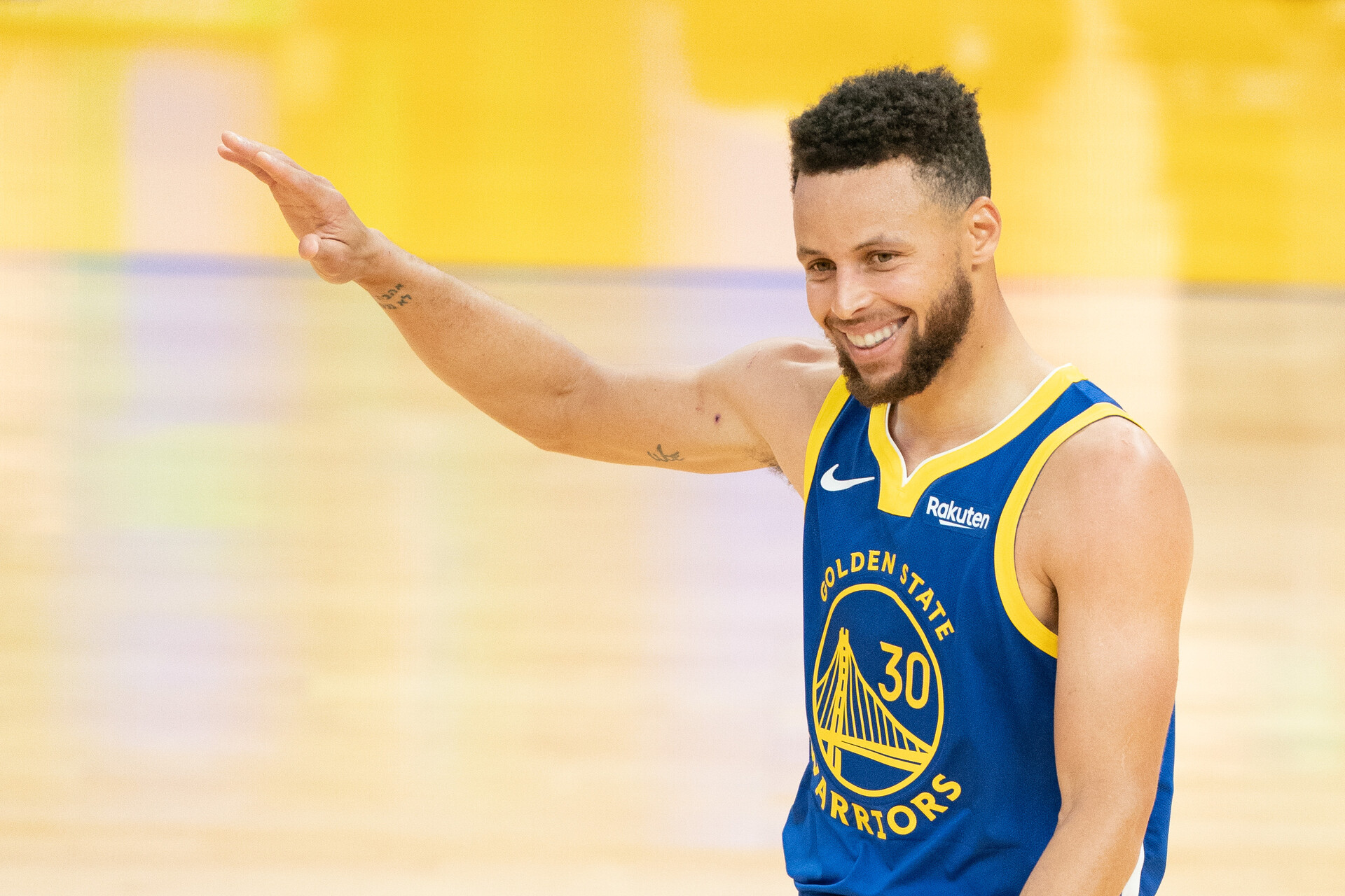 Golden State Warriors point guard #30 Stephen Curry celebrates in a 2021 road game.