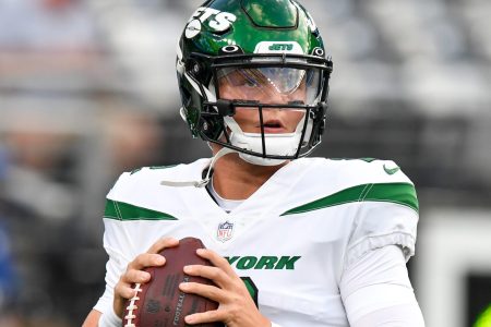 Jets quarterback Zach Wilson warms up before a 2021 road game.