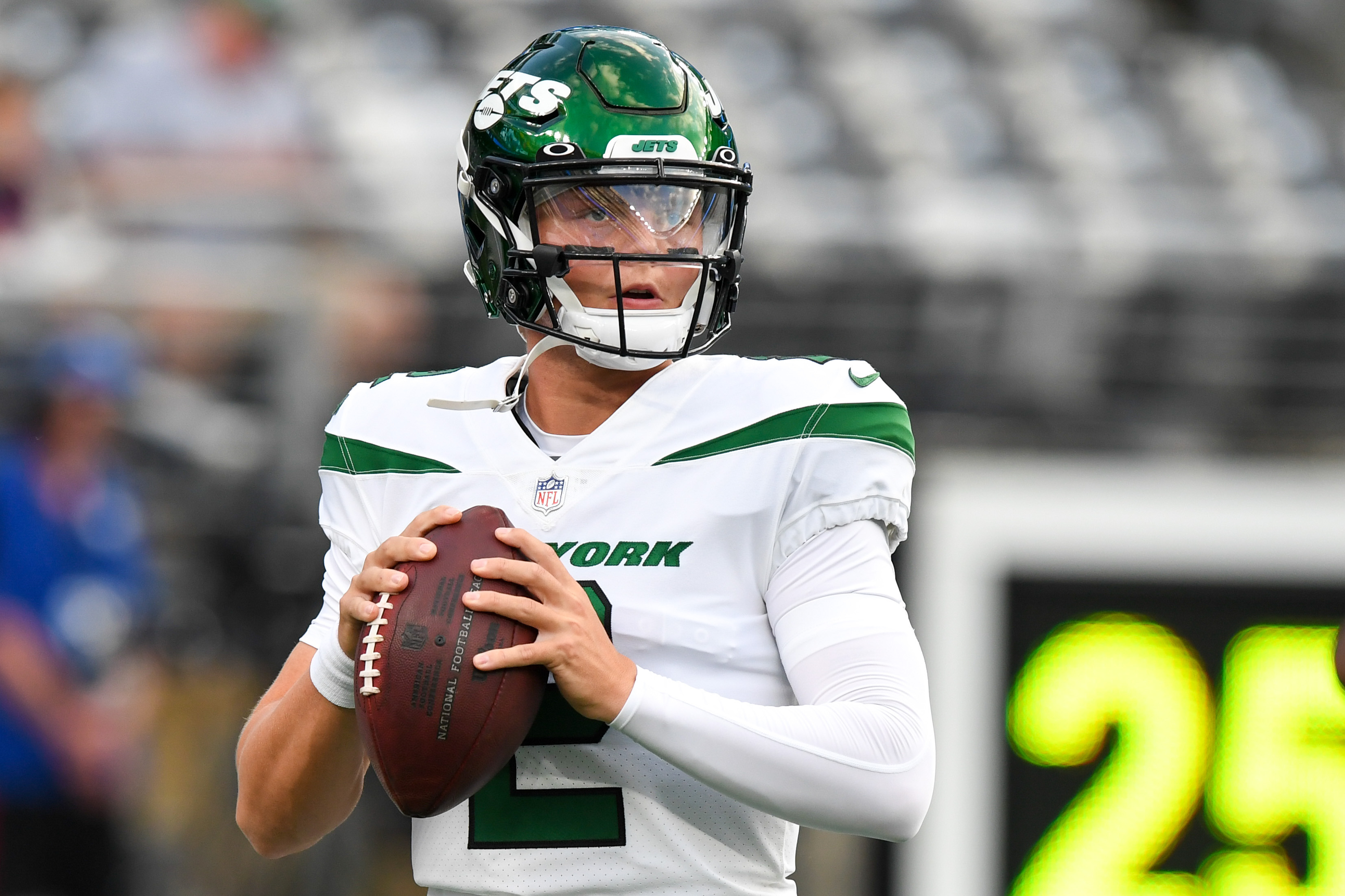 Jets quarterback Zach Wilson warms up before a 2021 road game.