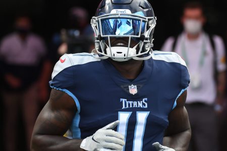 Tennessee Titans wide receiver #11 AJ Brown runs out of the tunnel prior to a 2020 home game.
