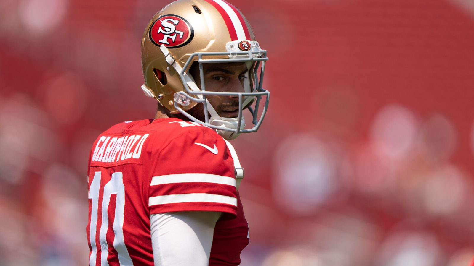 San Francisco quarterback #10 Jimmy Garoppolo warming up before a 2021 home game.