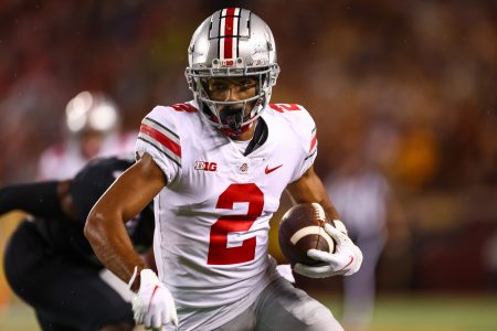 Ohio State receiver #2 Garrett Wilson looks for running room in a 2021 road game.