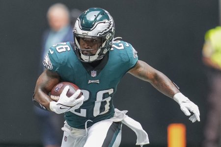 Philadelphia Eagles RB Miles Sanders runs with the football in a game