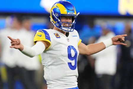 Los Angeles Rams quarterback Matthew Stafford #9 celebrates a touchdown pass in the Rams' 2021 season opening win over the Chicago Bears.