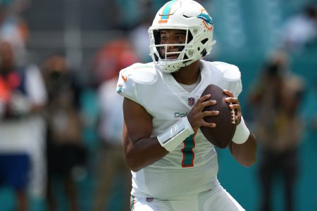 Miami Dolphins quarterback Tua Tagovailoa looks downfield in a 2021 road game.