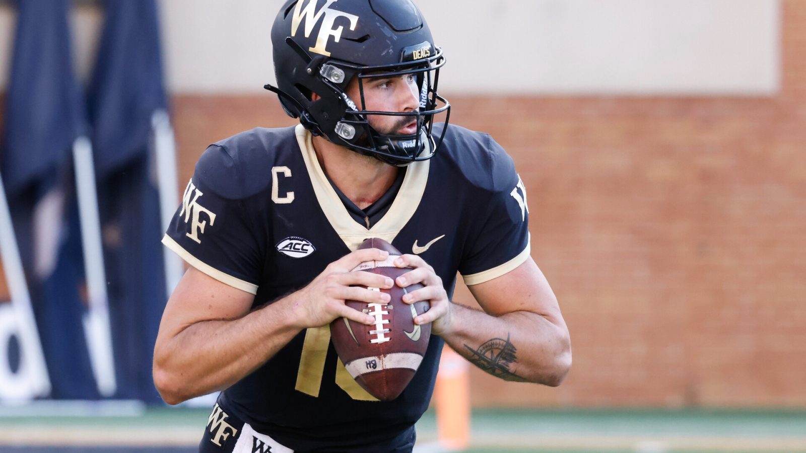 Wake Forest quarterback Sam Hartman looks downfield in a 2021 home game.