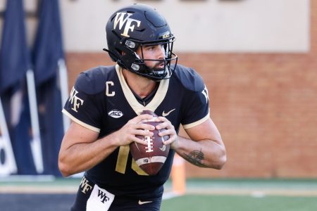 Wake Forest quarterback Sam Hartman looks downfield in a 2021 home game.