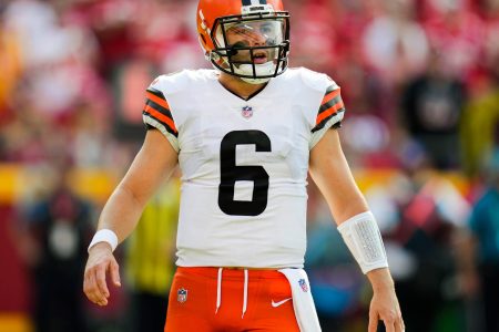 Cleveland Browns quarterback Baker Mayfield reacts after throwing a pass in a game