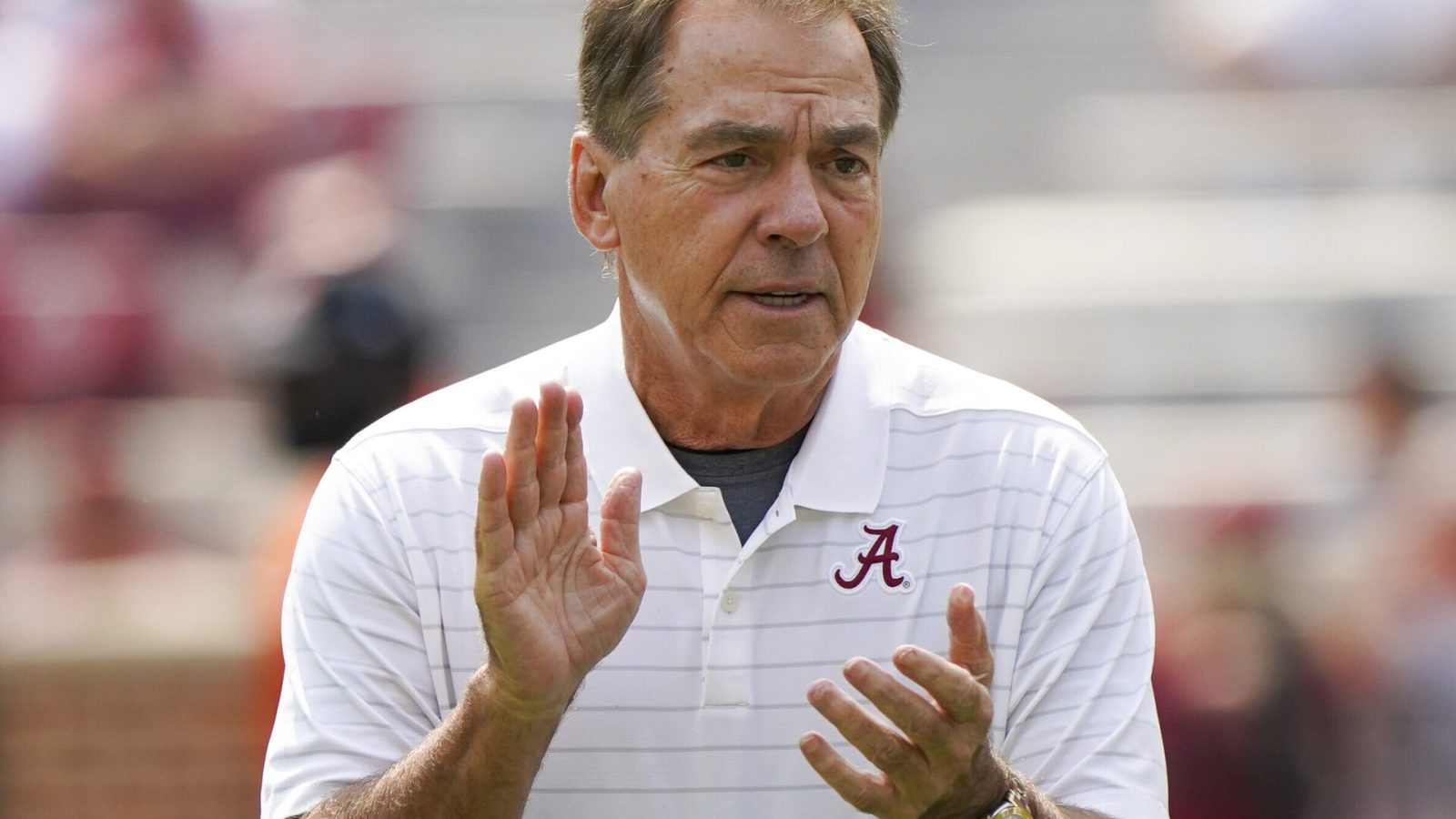 Alabama head football coach Nick Saban clapping