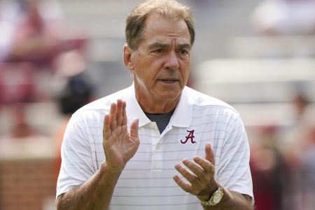Alabama head football coach Nick Saban clapping