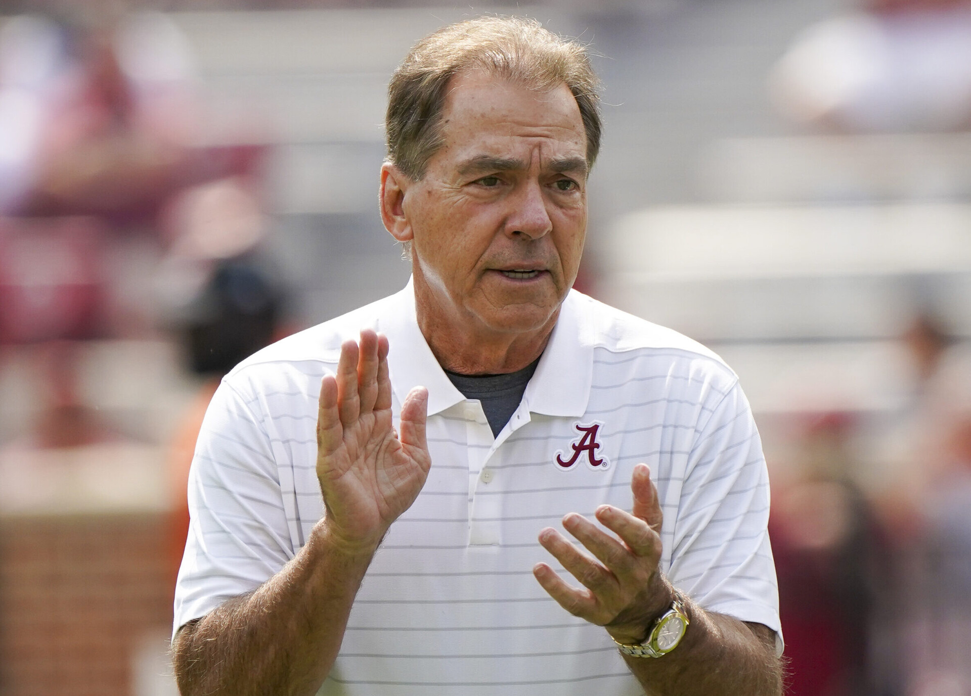 Alabama head football coach Nick Saban clapping