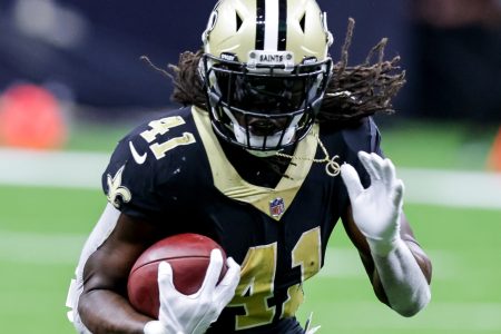 New Orleans Saints running back Alvin Kamara runs in the open field