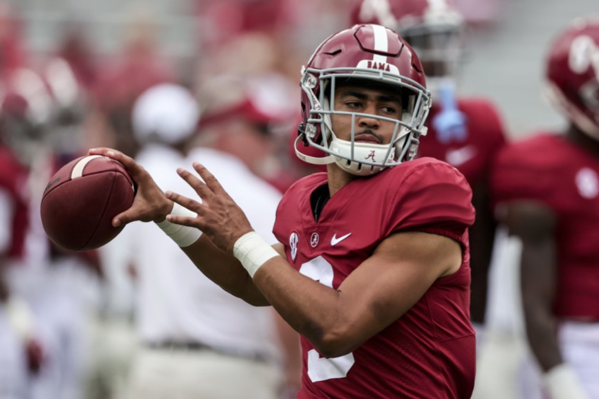 Alabama quarterback Bryce Young winds up to throw a pass during warmups