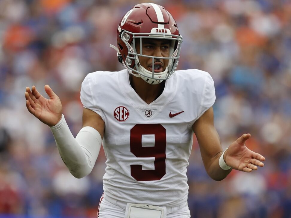Alabama quarterback Bryce Young claps his hands together at the snap of the football
