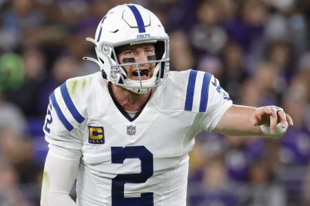 Oct 11, 2021; Baltimore, Maryland, USA; Indianapolis Colts quarterback Carson Wentz signals at the line of scrimmage