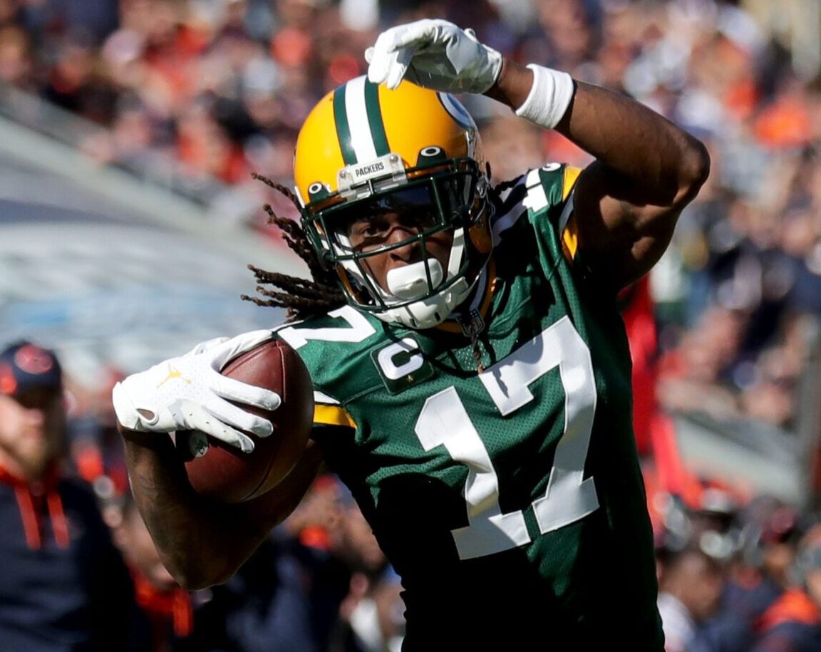 Green Bay Packers wide receiver Davante Adams tries to stay in bounds after a catch