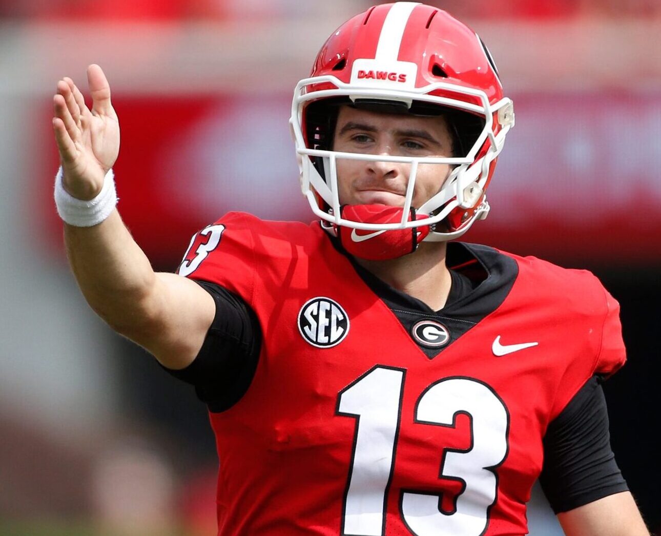 Georgia quarterback Stetson Bennett gestures for a first down during a game