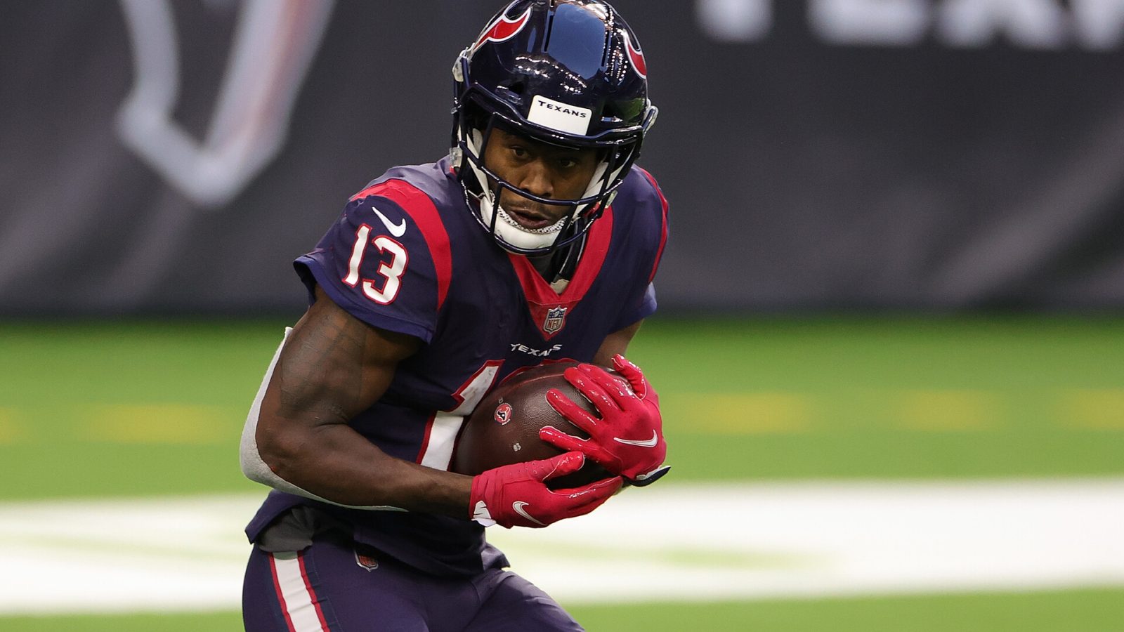 Houston Texans wide receiver Brandin Cooks makes a catch in a 2021 home game.