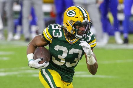 Aaron Jones runs the ball in a 2021 home game.