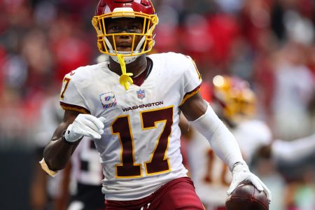 Washington Football Team wide receiver Terry McLaurin holds the football in his left hand after scoring a touchdown