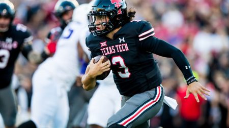 Henry Colombi #3 QB for Texas Tech looks for running room.
