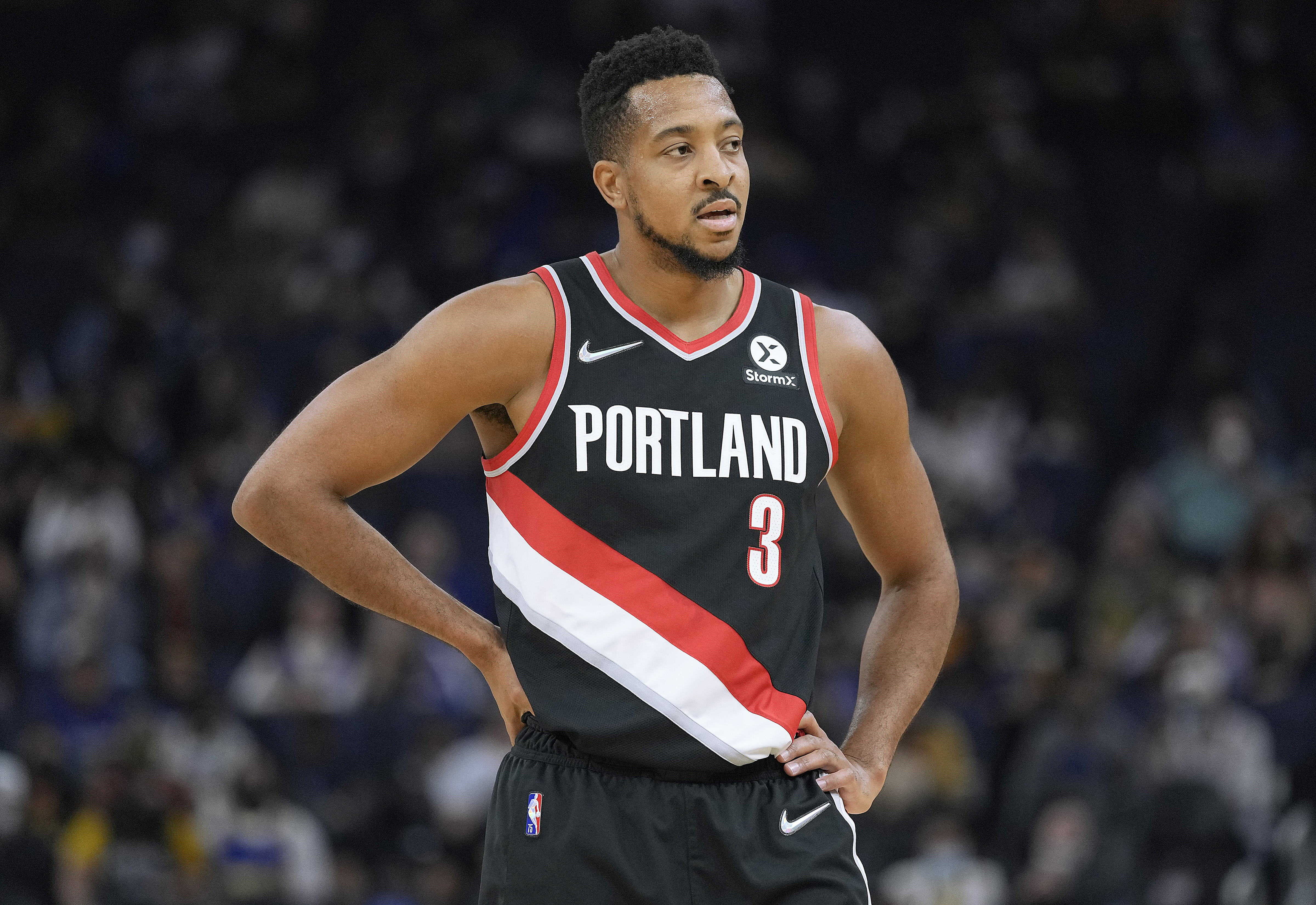 CJ McCollum looks on in a 2021 NBA game for the Portland Trailblazers.