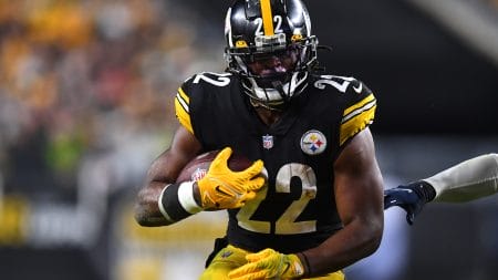 Pittsburgh Steelers running back #22 Najee Harris carries the ball in a 2021 home game.