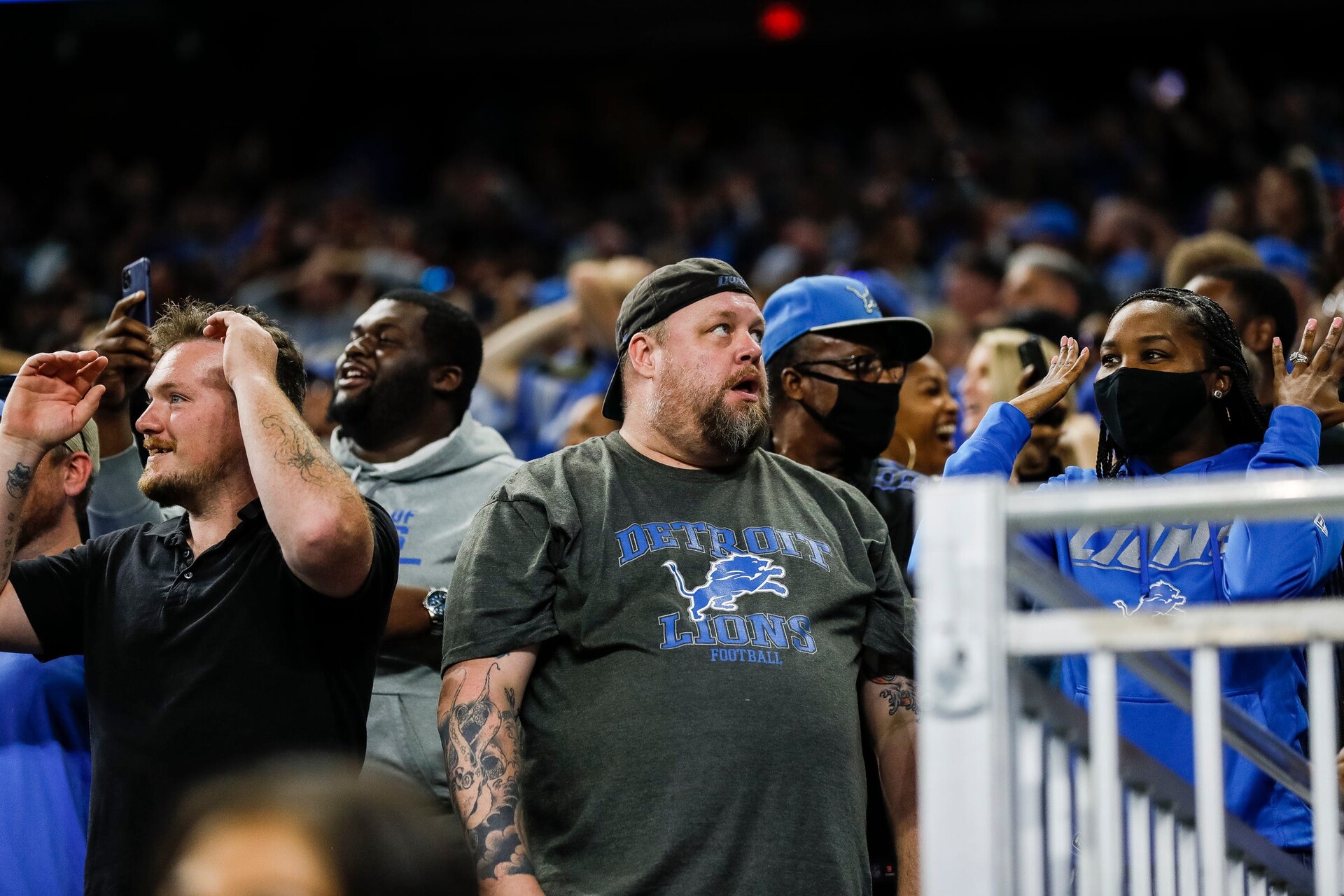 Lions fans react in shock after a loss to the Baltimore Ravens