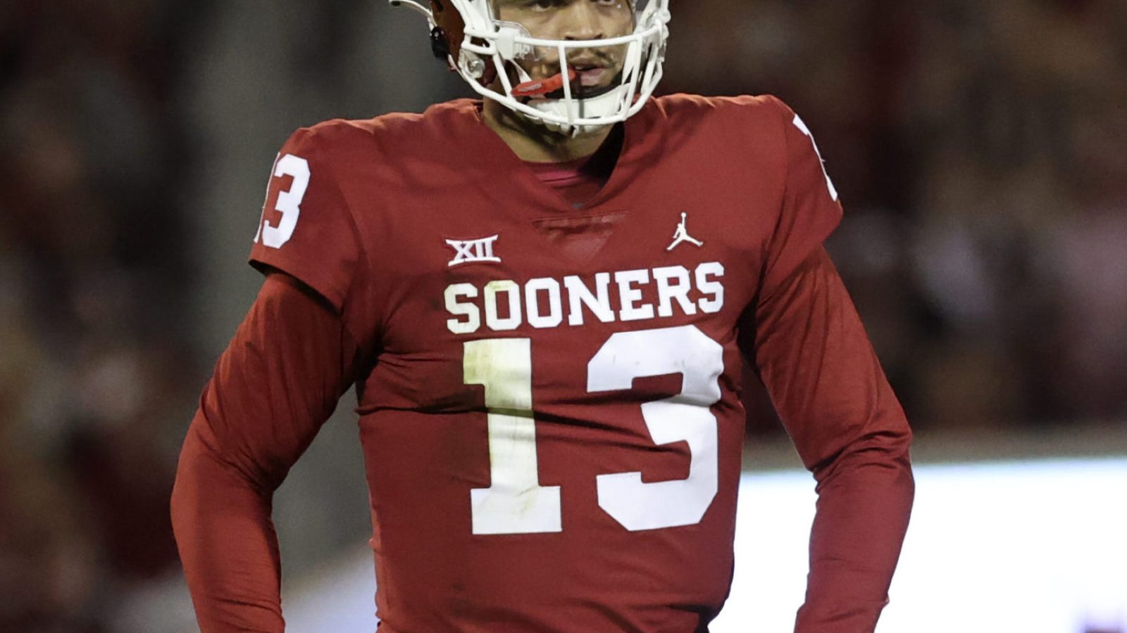 Oklahoma Sooners quarterback Caleb Williams pumps his fists below his waist after throwing a touchdown pass against TCU.