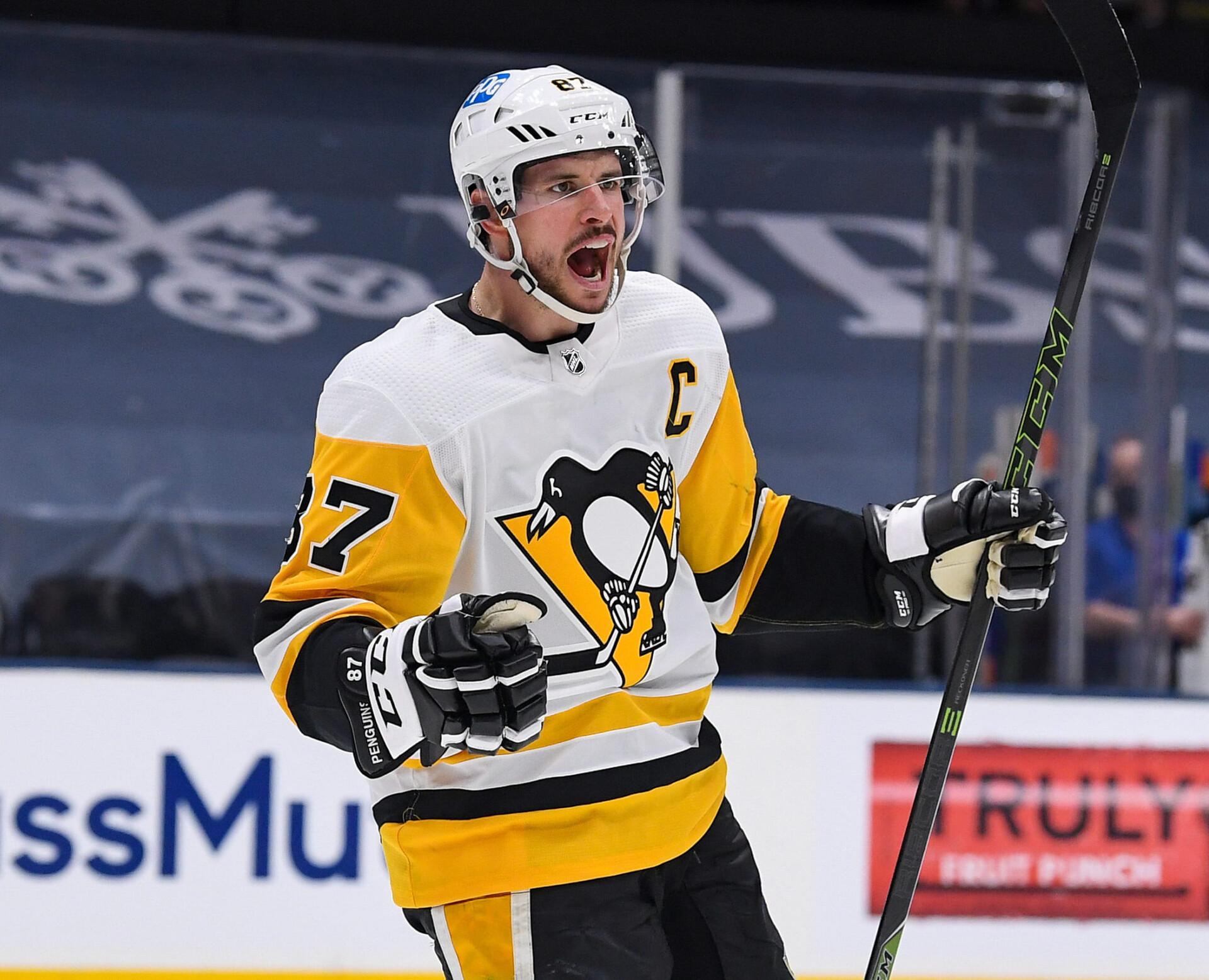 Pittsburgh Penguins center Sidney Crosby celebrates after a teammate scores a goal