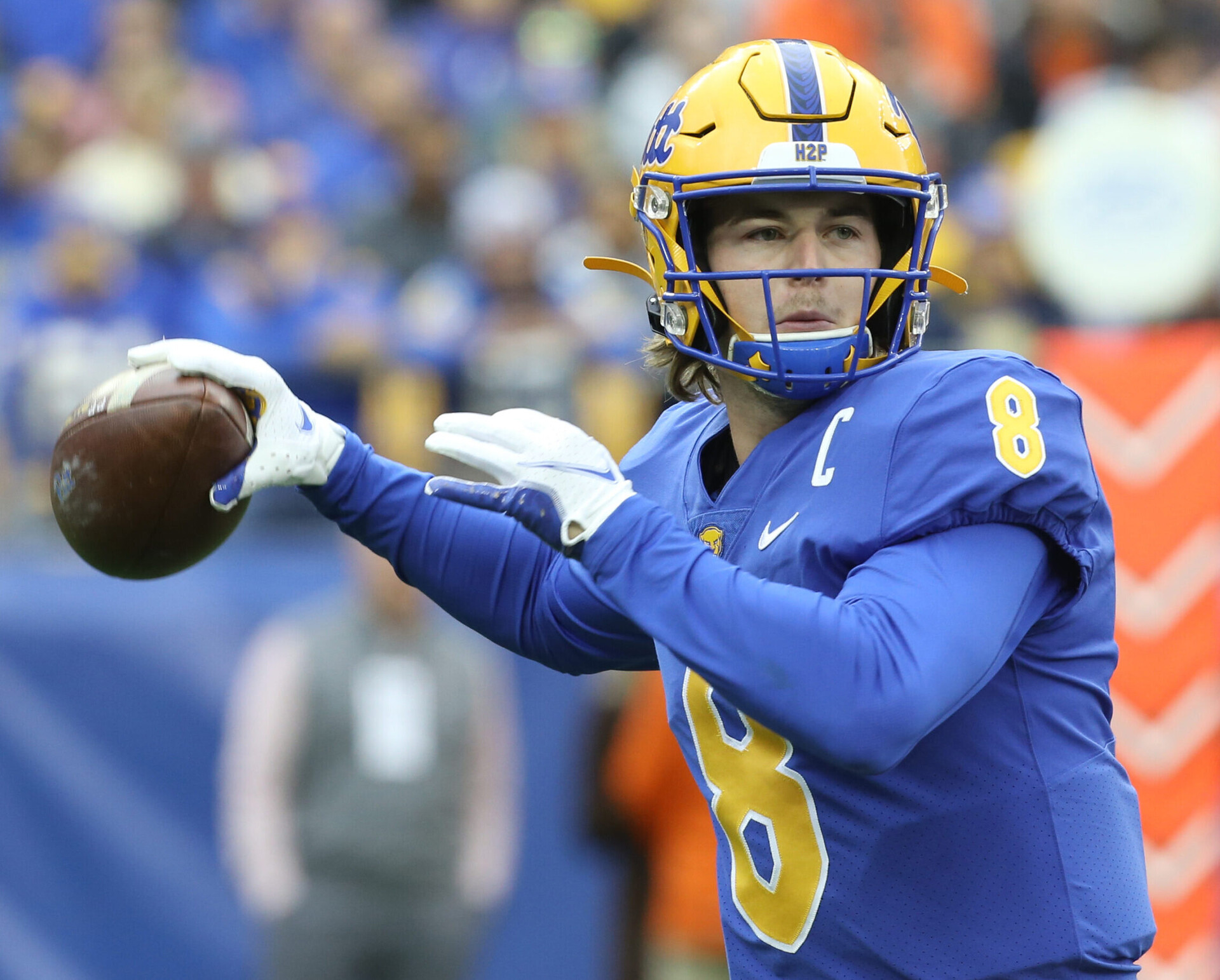 University of Pittsburgh quarterback Kenny Pickett winds up to throw a pass