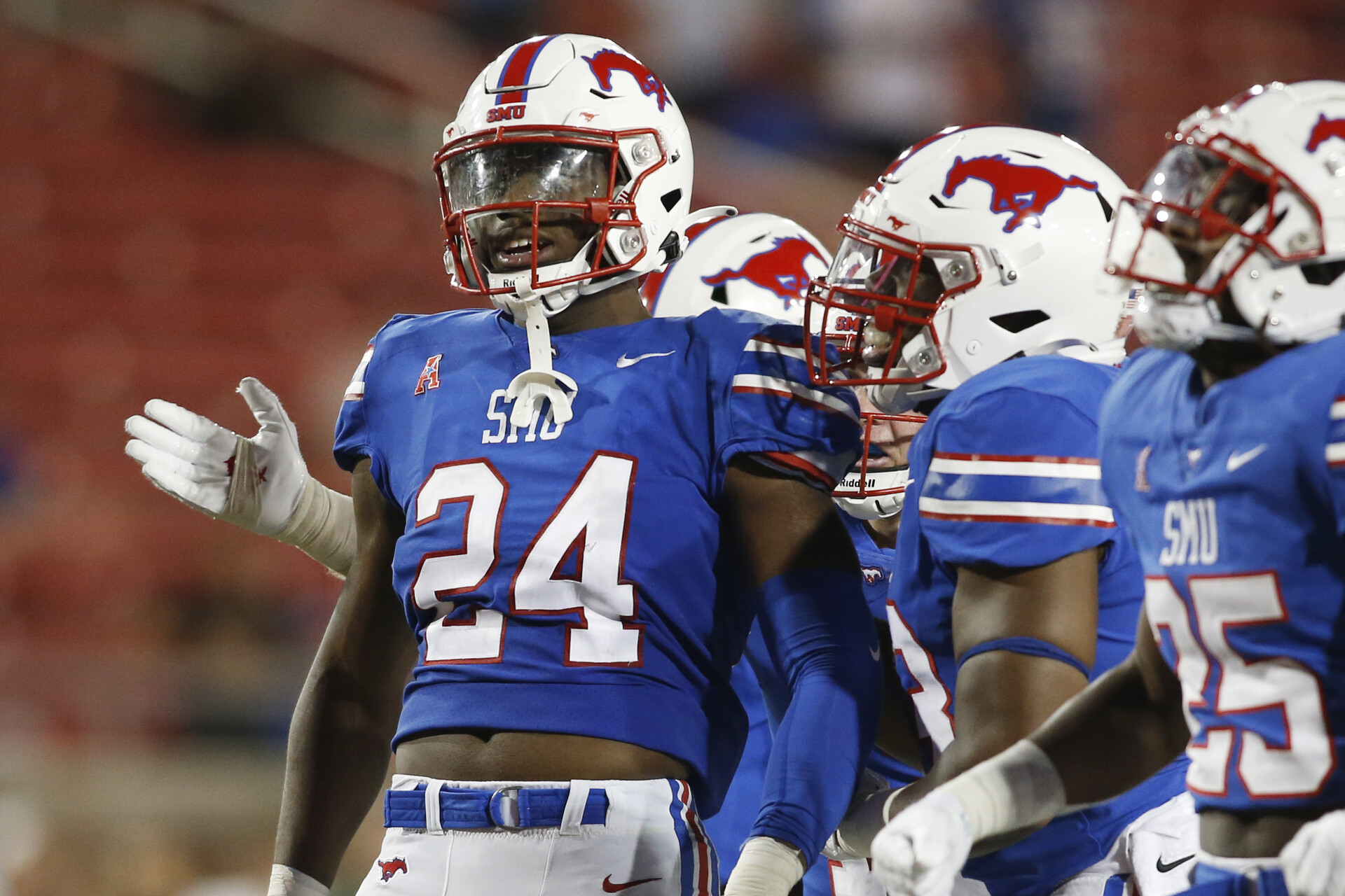 Southern Methodist Mustangs linebacker Jimmy Phillips Jr. reacts with teammates after a play