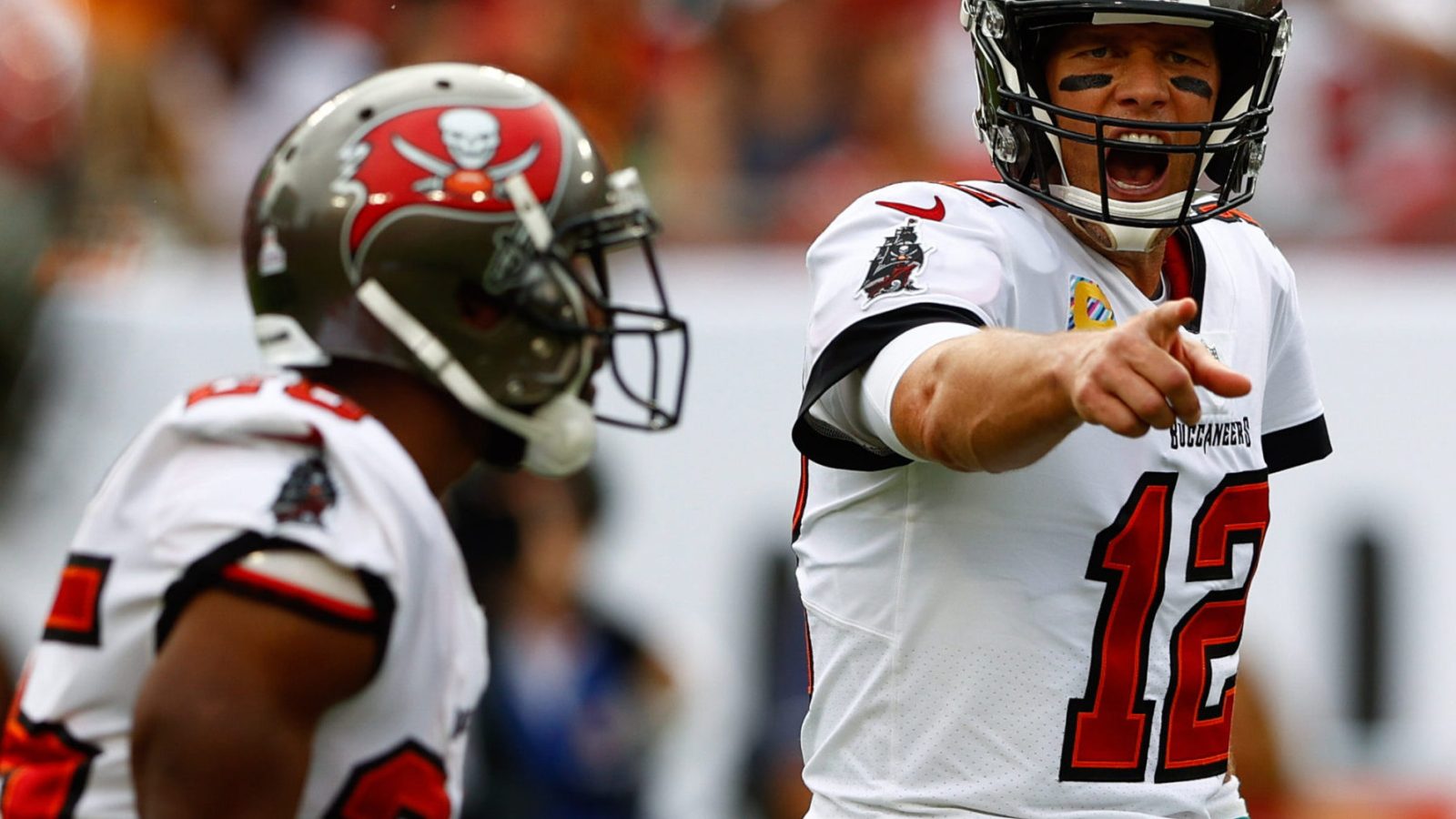Tampa Bay Buccaneers quarterback Tom Brady, right, calls a play at the line in the first half against the Chicago Bears at Raymond James Stadium.