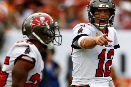 Tampa Bay Buccaneers quarterback Tom Brady, right, calls a play at the line in the first half against the Chicago Bears at Raymond James Stadium.