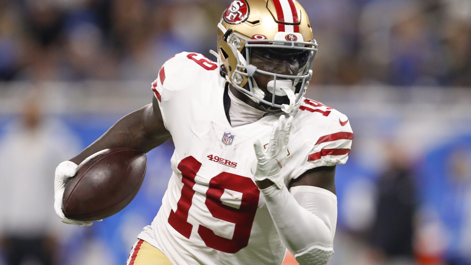 San Francisco wide receiver #19 Deebo Samuel tries to find running room in a 2021 road game.
