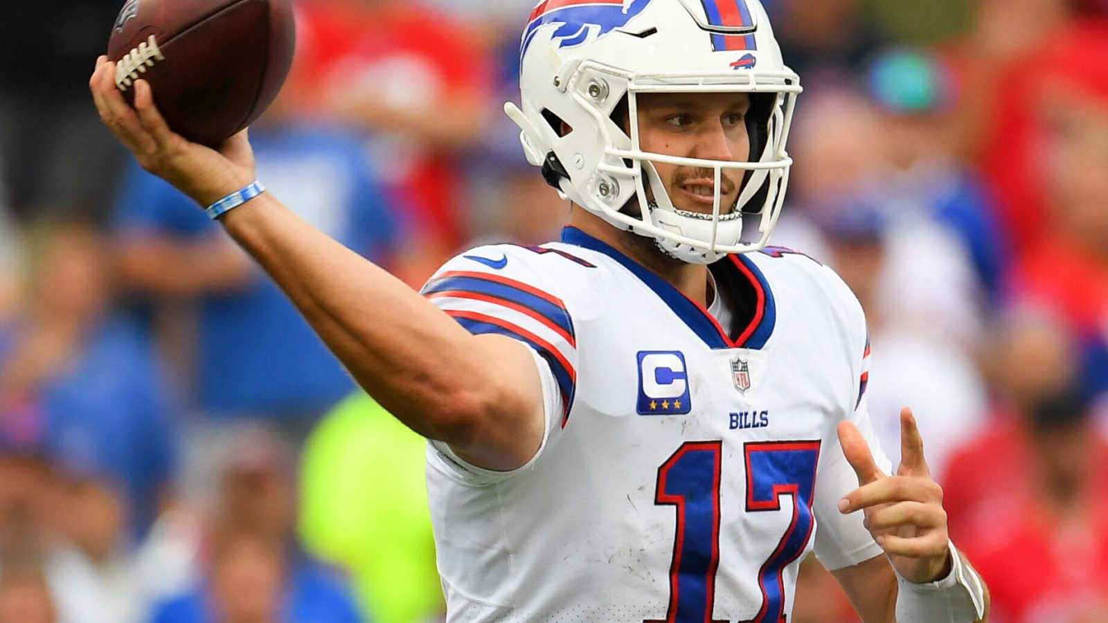 Buffalo Bills quarterback Josh Allen throws a pass downfield in a 2021 game.
