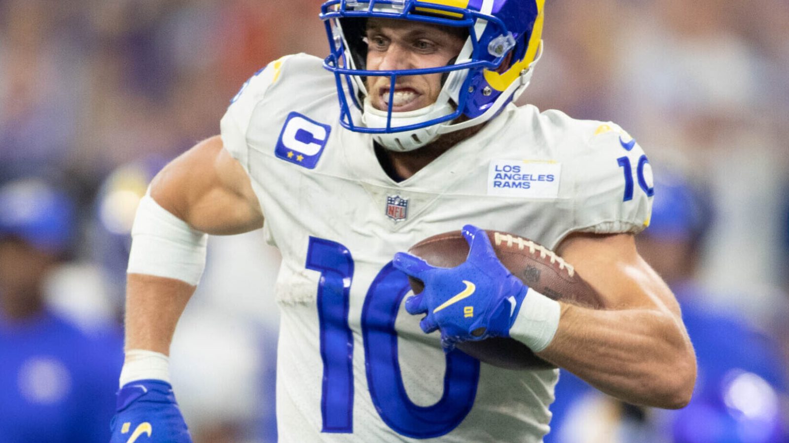 Los Angeles Rams wide receiver #10 Cooper Kupp runs down the sideline in a 2021 road game.