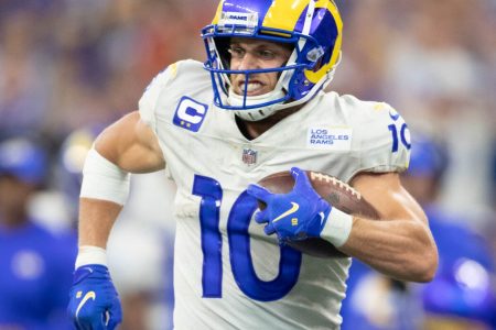 Los Angeles Rams wide receiver #10 Cooper Kupp runs down the sideline in a 2021 road game.