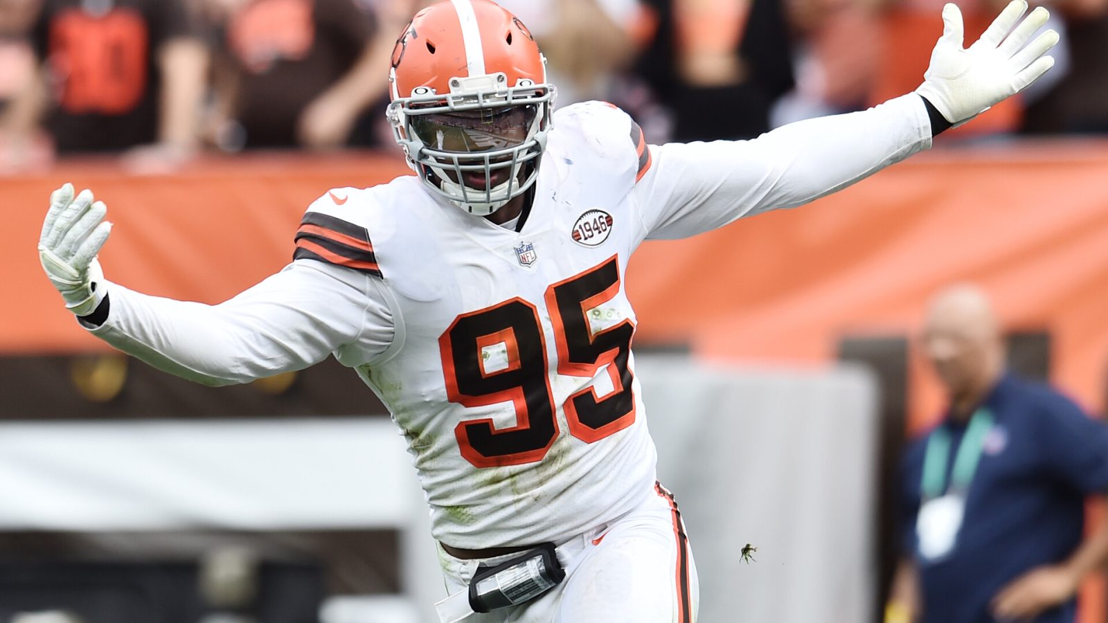 Myles Garrett #95 of the Cleveland Browns celebrates a sack in a 2021 home game.