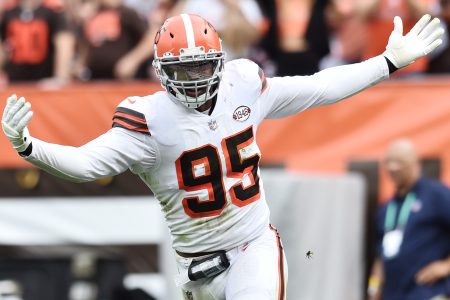 Myles Garrett #95 of the Cleveland Browns celebrates a sack in a 2021 home game.