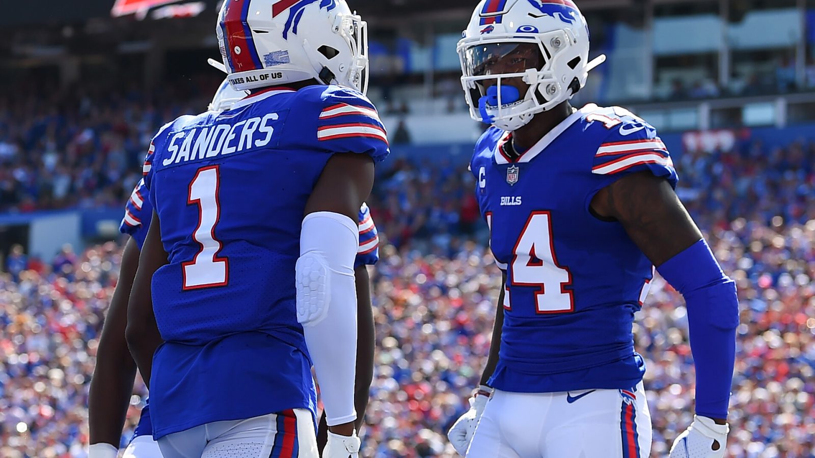 Buffalo Bills wide receivers Emmanuel Sanders (left) and Stefan Diggs (right) celebrate after a touchdown