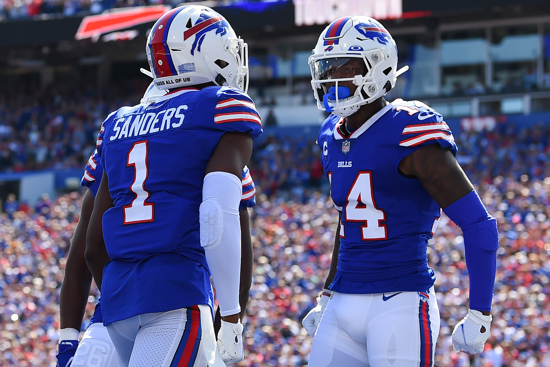 Buffalo Bills wide receivers Emmanuel Sanders (left) and Stefan Diggs (right) celebrate after a touchdown